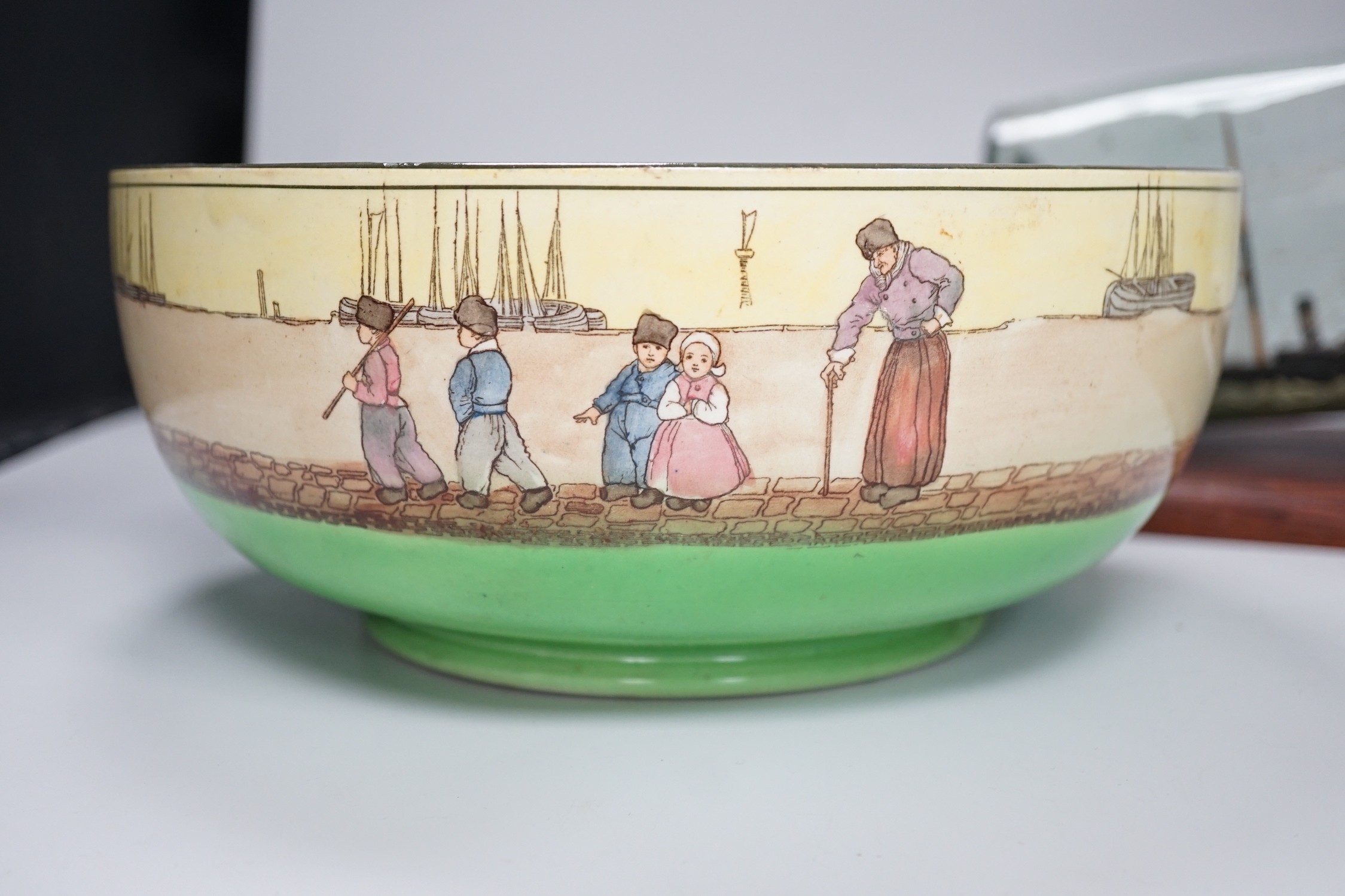 A Royal Doulton series ware bowl, a ship in a bottle and a Gordon Highlanders white metal mounted swagger stick